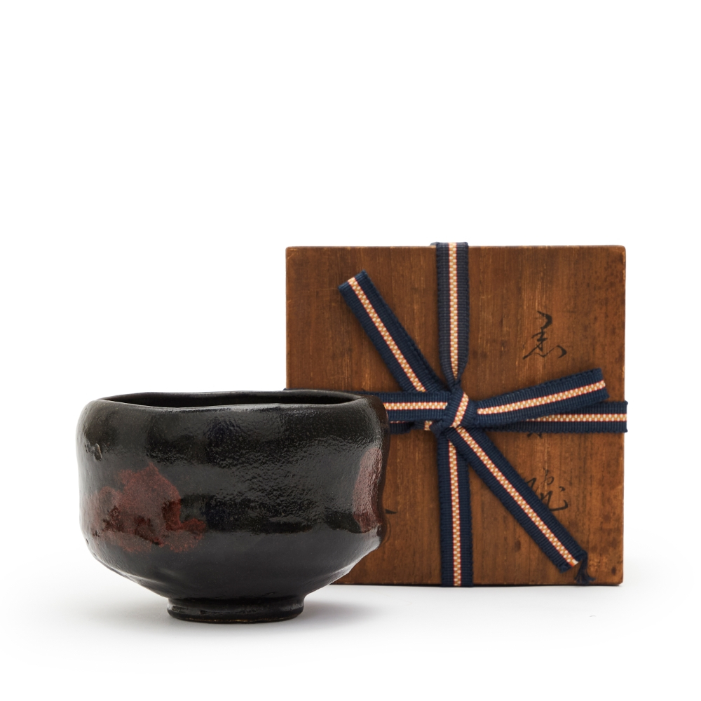RAKU KAKUNYŪ KICHIZAEMON XIV, 1918-1980. A Red Raku Ware Tea Bowl Named
